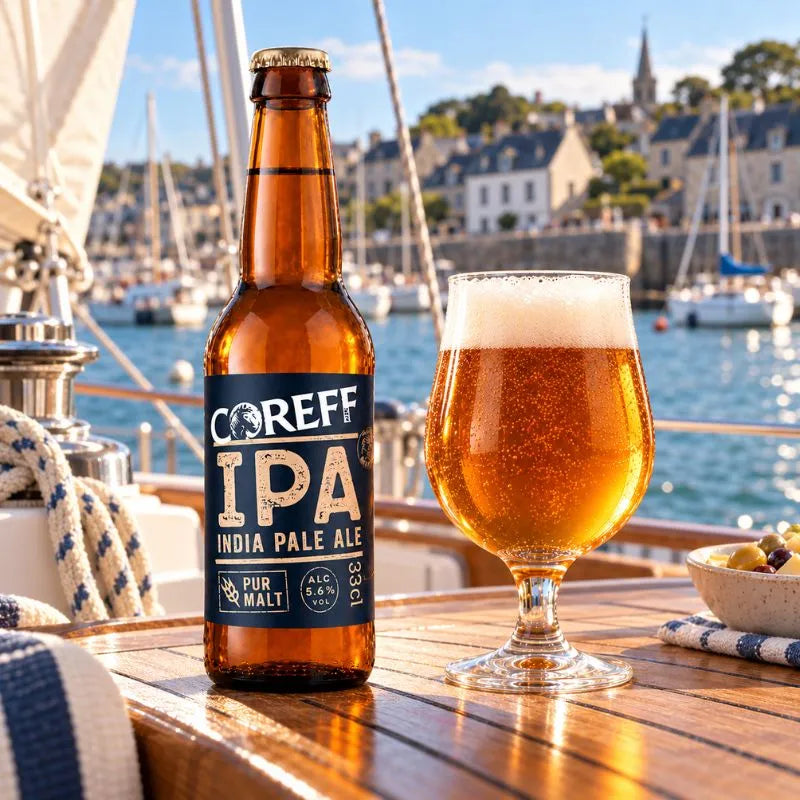 Bouteille de bière Coreff IPA India Pale Ale Pur Malt à étiquette bleu nuit et capsule dorée